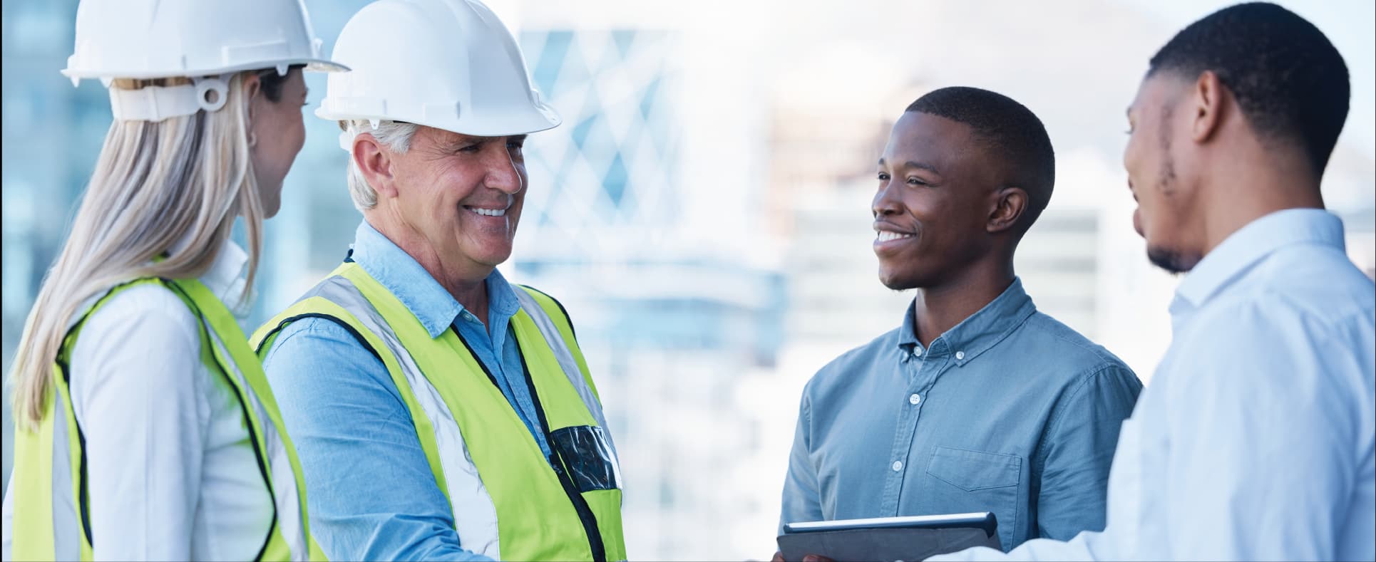 Two teams meeting and smiling